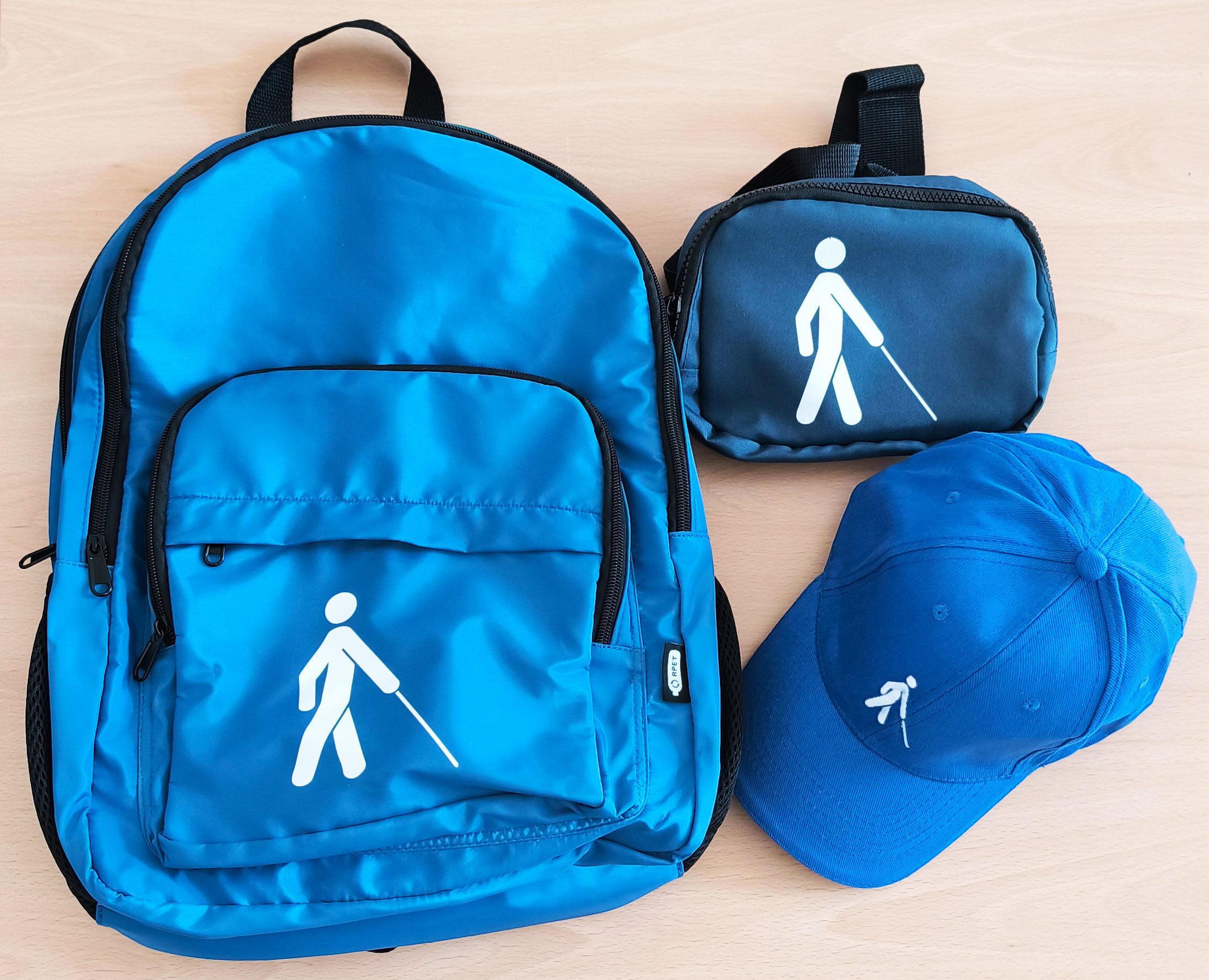 Backpack, Basecap, Bumbag, blue with white pictogramme man with cane