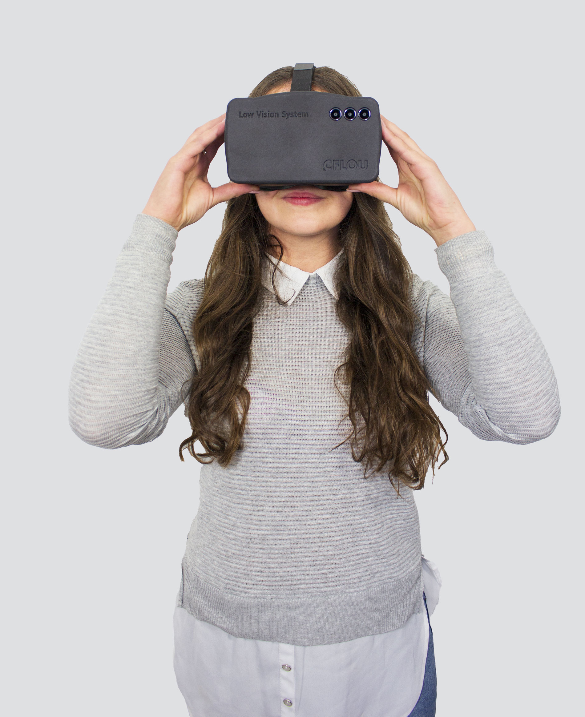 A young woman wears EasyReality low-vision simulation glasses to realistically simulate visual impairment