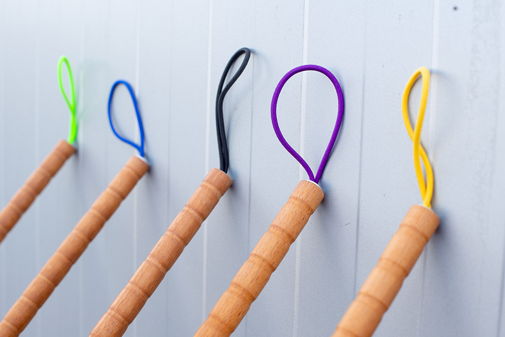 Handles of children's canes with colored loops