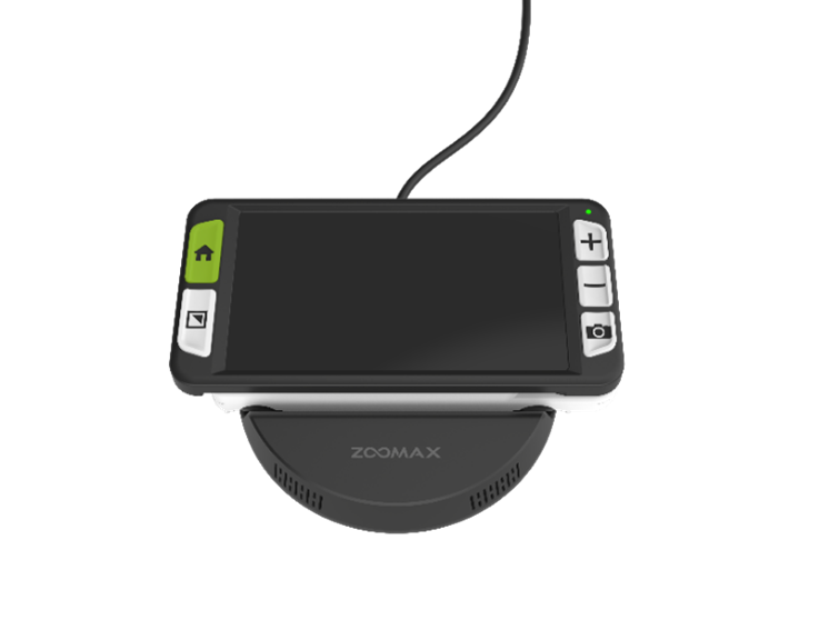 Electronic magnifier with a large screen, several buttons on the sides and an inductive charging station with a cable connection.