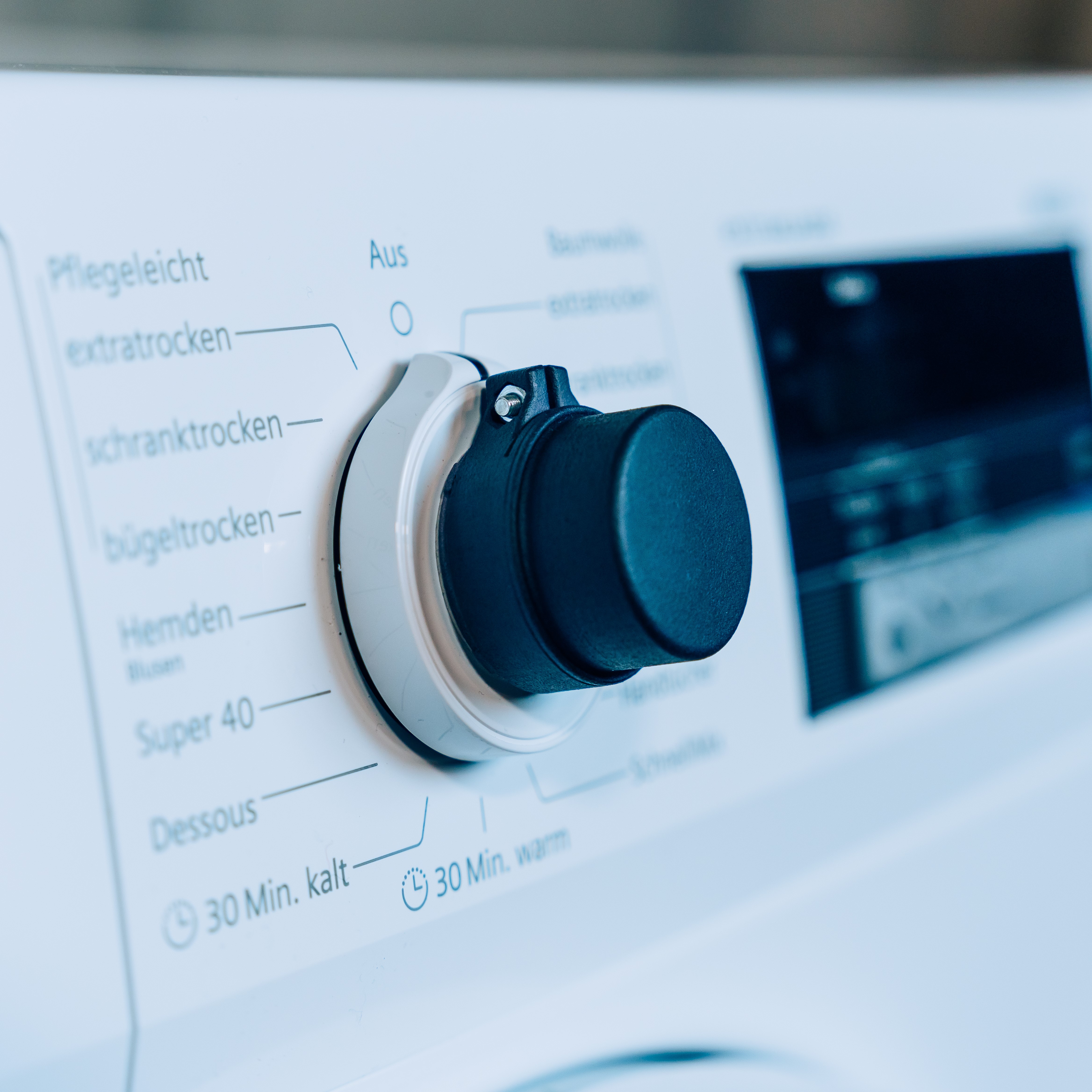 The Feelware Audio control knob is mounted on the program selector switch of the washing machine.